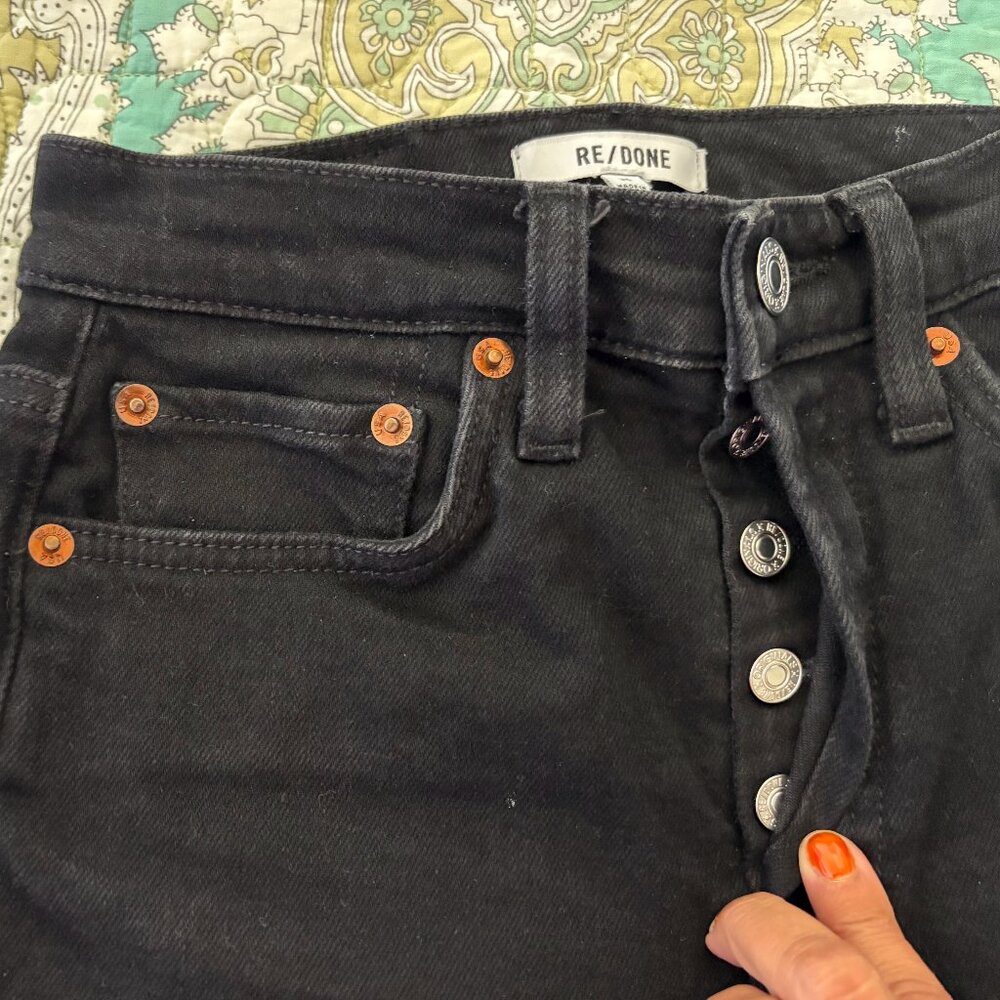 RE/DONE blk denim 5 button, copper & silver rivets, fringed hem, size 25